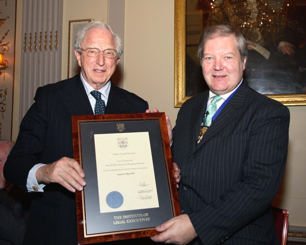 I ampresenting the recently retired Lord Chief Justice, Lord Harry Woolf with his Fellowship certificate.